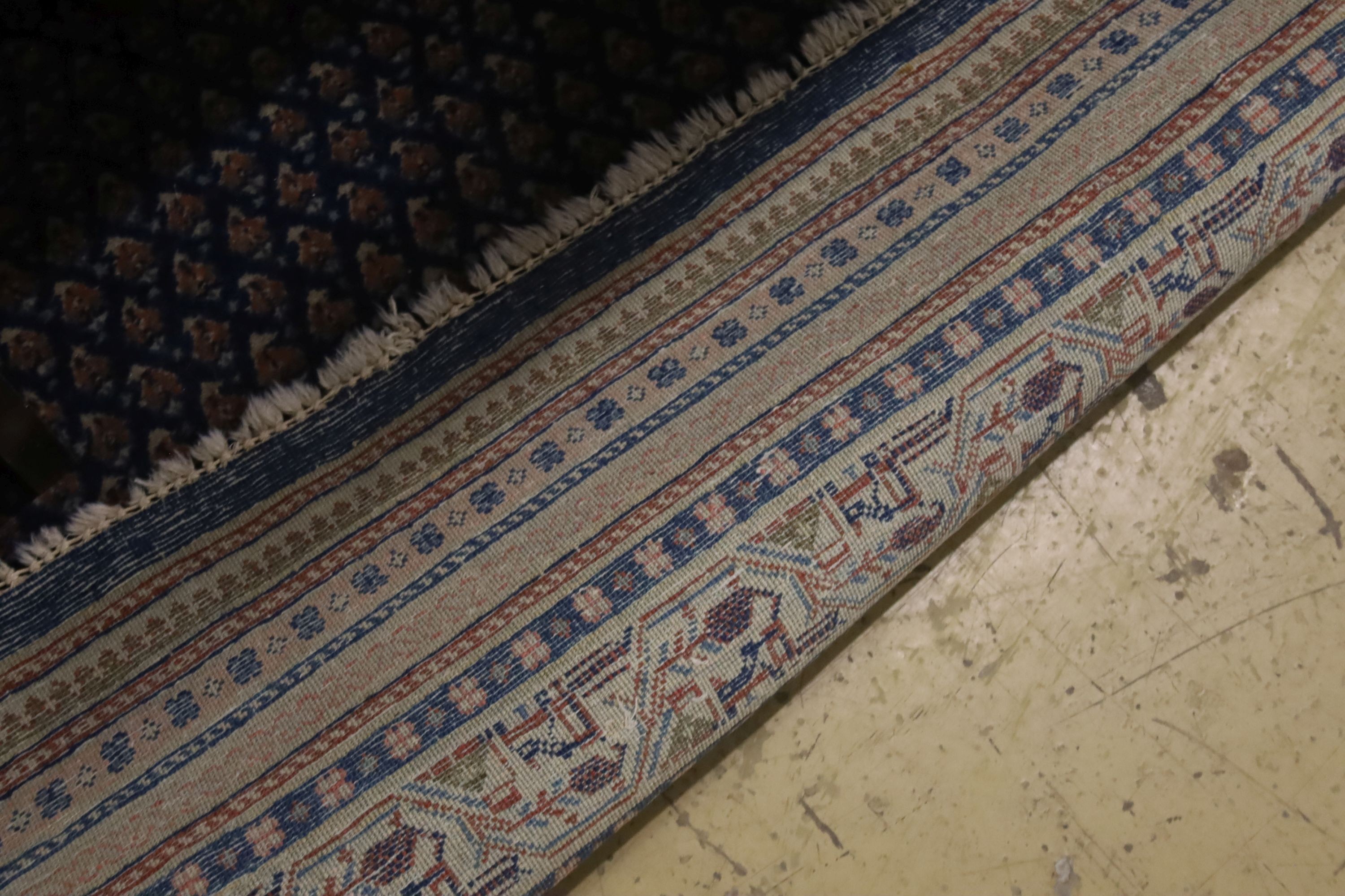 A Tabriz blue ground carpet